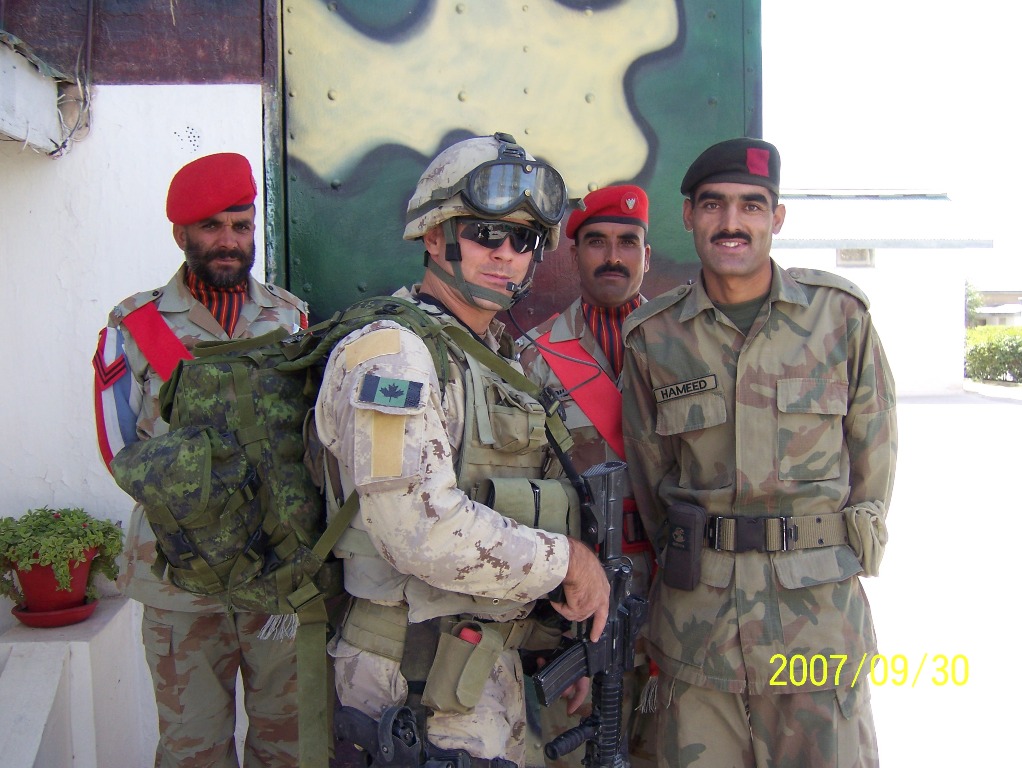 This is PENATRATOR at the Afghan - Pakistani border.  I posted this picture for him because he has a very limited access to the internet.  He is seen here with some Pakistani soldiers.  

