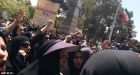 Violence on streets of Iran as police use tear gas on protesters