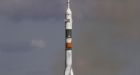 Rocket carrying Americans, Russian launches on space station voyage