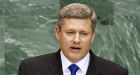 Harper skips hearing, names new judge to top court