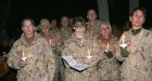 Troops enjoy turkey at Christmas dinner in Kandahar