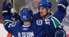 Canucks hang on to go 2 up on Hawks