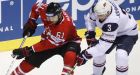 Canada squeaks by U.S. at hockey worlds