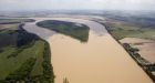 Mississippi River overflows Louisiana levee