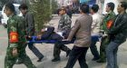 China bank bomb injures 40