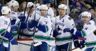 Ryan Miller, Canucks hold off Islanders in shootout