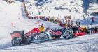 Formula 1 car races down Kitzbuehel's Streif ski course