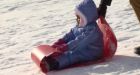 Hello, winter! Newcomers to Canada enjoy the snow in Pippy Park