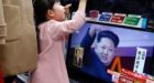 North Korea praises rocket; others view as covert missile test