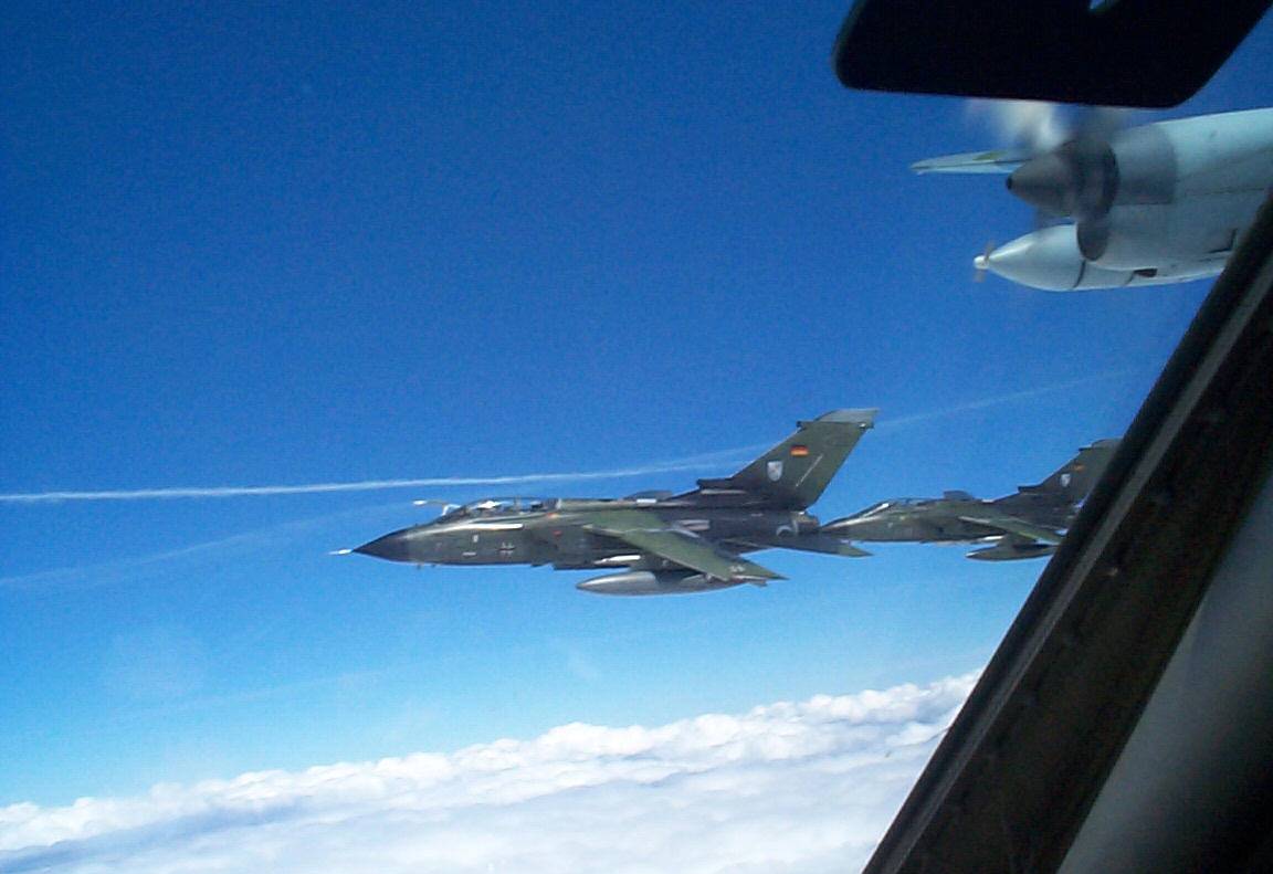 German Air Force Tornadoes in formation with Canadian KC130 tanker over Goose Bay.