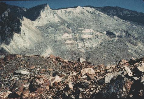 The Hope slide, 18 kilometres east of Hope, was one of the largest slides in Canadian history. The southwestern slope of Johnson Peak, collapsed on January 9, 1965, spreading 47 million cubic metres of debris, 85 metres thick, over a 3 kilometre stretch of the Hope-Princeton highway. The slide occurred in an unpopulated area in early morning hours and resulted in four deaths (photo courtesy of the Ministry of Environment, Lands and Parks).