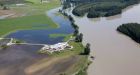 Hot weather and snow melt causes Fraser River to swell