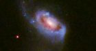Supermassive black hole caught 'burping' twice after colliding with nearby galaxy