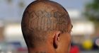 Deportation halted because mans gang tattoos could cause people to think he is in a gang