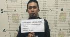 Top militant linked to beheading of 2 Canadians surrenders in Philippines