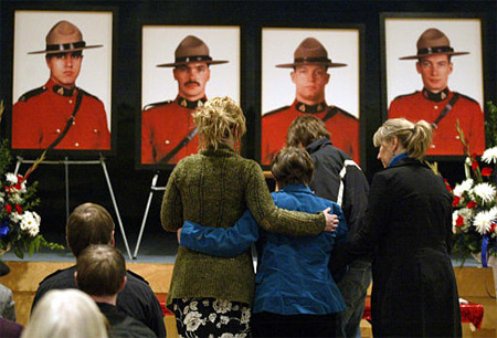 Trial set for men accused of aiding gunman who killed four Mounties