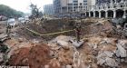 The giant 30 ft deep crater left by suicide blast injured 6 Britons, killed at least 52 people