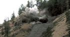 Blasting begins to remove volatile rock face that closed Highway 97