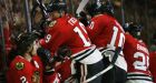 OT goal gives Blackhawks win over Canucks, ties series