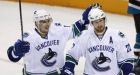 Sedin brothers lead Canucks to win over Sharks