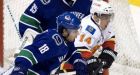 Canucks fend off Flames in shootout