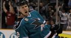 SHARKS GET GOALS FROM EIGHT IN WIN OVER FLAMES