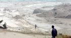Chinese mudslides claim at least 80 lives