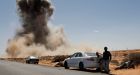 Libyan rebels regroup as warplanes hit key oil port