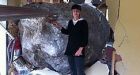 Man auctions boulder that crashed through his house