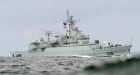 Chinese warship freed from disputed shoal, averts stand-off