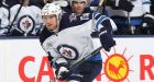 Jets re-sign forward Kyle Wellwood