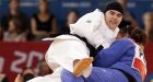 1st female Saudi Olympian loses judo bout