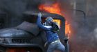 Section of Kyiv protest camp engulfed in flames as police advance after nine people killed in street clashes