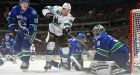 Sharks roll past listless Canucks