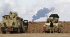 Islamic State torches oil field near Tikrit as militia advance