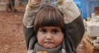Syrian girl's 'surrender' to photographer caught in heartbreaking image