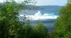 'Get off the beach': Newfoundland iceberg breaks, stirs up huge waves