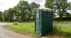 Portable toilet moved across festival site with woman still inside