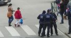 Brussels manhunt after gunfire in raid 'on Paris suspects'