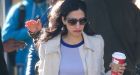 Huma Abedin weeps openly as she returns to Clinton campaign headquarters